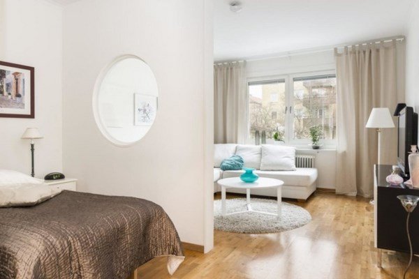 Современный дизайн гостиной 2026 в разных стилях: идеи, фото