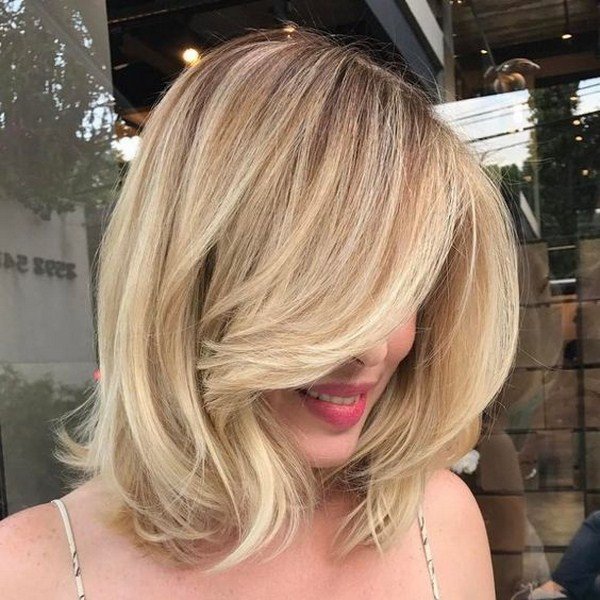 Новинки стрижек на средние волосы 2026: фото-примеры